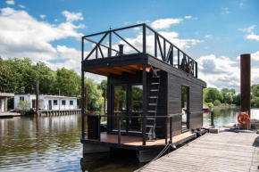 Tiny-Hausboot LIKEDEELER mit Dachterasse und Kamin